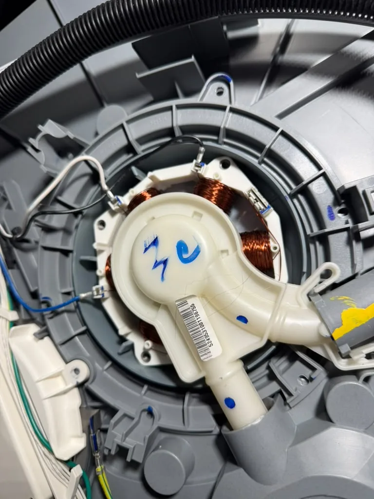 Dishwasher pump assembly exposed for service